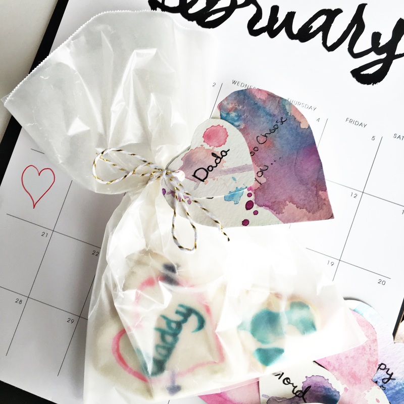give watercolor cookies with cute watercolor tags